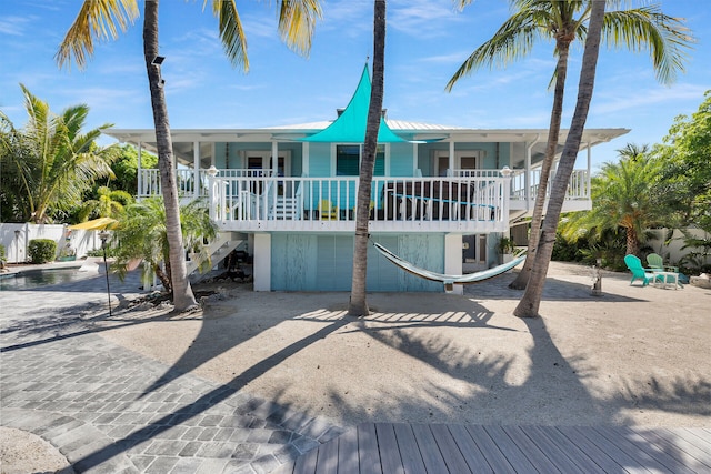 835 70th St, Gulf, Marathon, FL 33050 - view of front of house featuring stairway and a porch