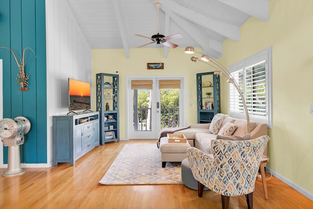 835 70th St, Gulf, Marathon, FL 33050 - living room featuring light wood-style floors, a ceiling fan, beam ceiling, and high vaulted ceiling
