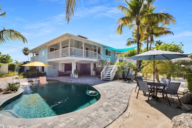 835 70th St, Gulf, Marathon, FL 33050 - outdoor pool with a patio, stairway, outdoor lounge area, and outdoor dining area