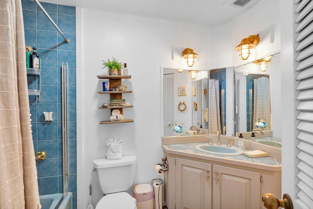 835 70th St, Gulf, Marathon, FL 33050 - bathroom featuring vanity, toilet, and shower / bath combination with curtain