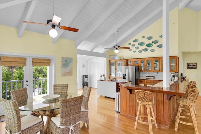 835 70th St, Gulf, Marathon, FL 33050 - dining space featuring a ceiling fan, high vaulted ceiling, light wood-style flooring, beamed ceiling, and french doors