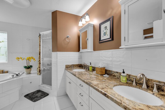 210 14th St, Key Colony, FL 33051 - full bath featuring a shower stall, tile walls, and a sink