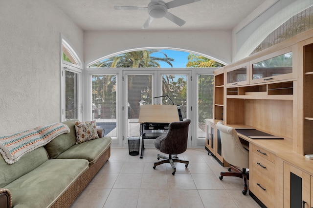 210 14th St, Key Colony, FL 33051 - office space with a textured wall, built in desk, a textured ceiling, and light tile patterned floors