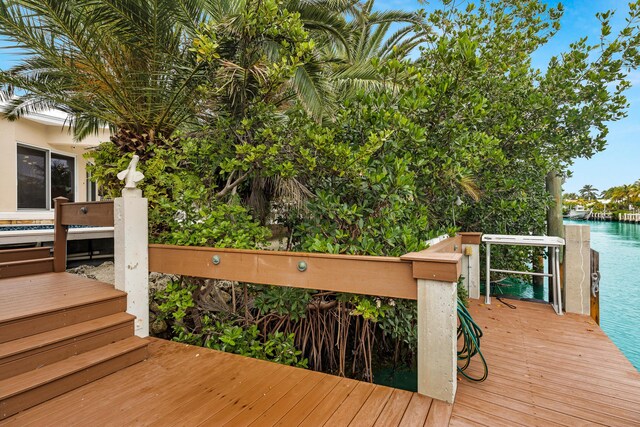 210 14th St, Key Colony, FL 33051 - wooden terrace featuring a dock and a water view