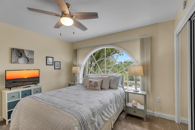 210 14th St, Key Colony, FL 33051 - carpeted bedroom featuring a ceiling fan and baseboards