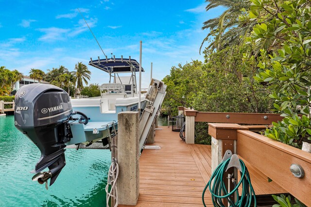 210 14th St, Key Colony, FL 33051 - view of dock featuring boat lift