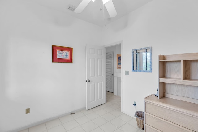 unfurnished bedroom featuring ceiling fan, visible vents, and baseboards