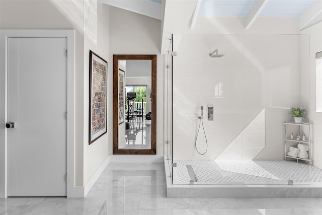 full bath featuring marble finish floor, beamed ceiling, baseboards, and walk in shower