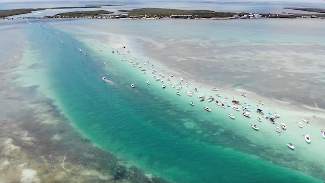 aerial view featuring a beach view and a water view