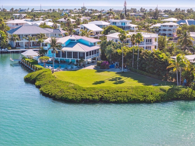 aerial view with a water view and a residential view