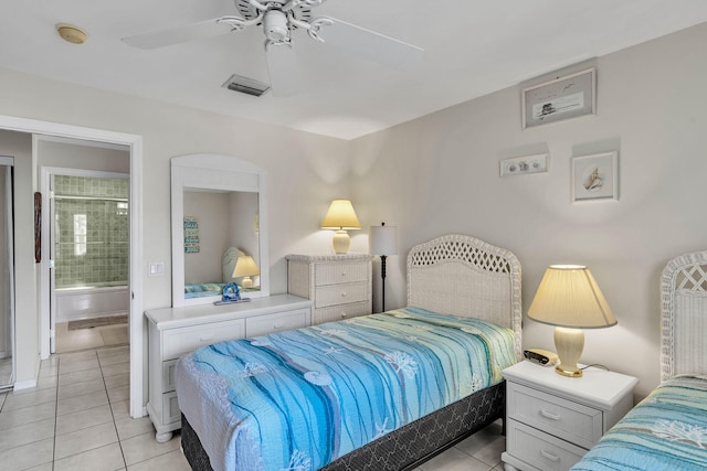 bedroom featuring light tile patterned floors, ceiling fan, connected bathroom, and visible vents