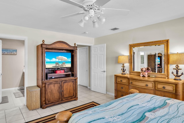 bedroom with light tile patterned floors, baseboards, visible vents, and a ceiling fan