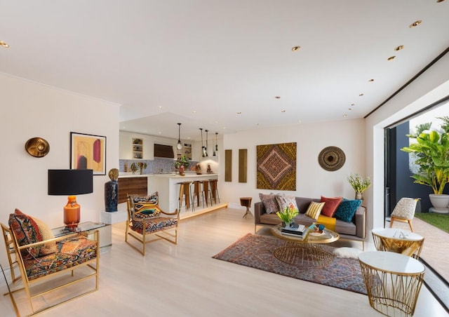 living room featuring light wood-type flooring and recessed lighting