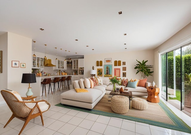 living room with light tile patterned floors and recessed lighting