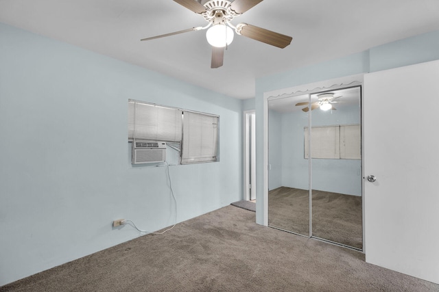 unfurnished bedroom featuring carpet, a closet, cooling unit, and ceiling fan