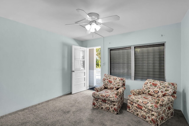 sitting room featuring carpet flooring and ceiling fan