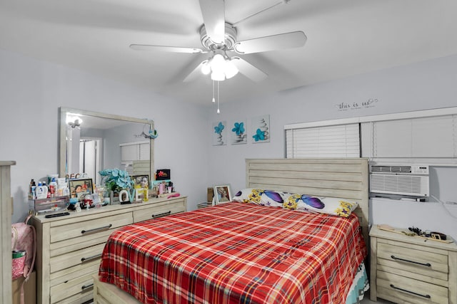 bedroom with a ceiling fan and cooling unit