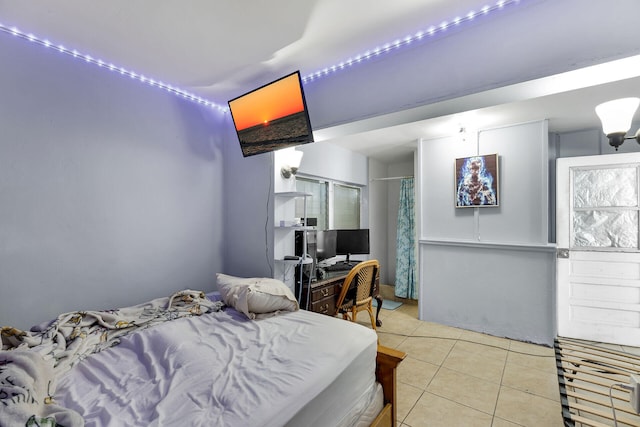 bedroom with light tile patterned flooring
