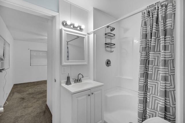 bathroom with shower / bath combo and vanity