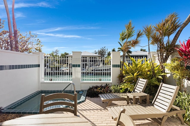 view of patio / terrace with fence