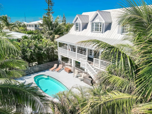 view of pool with a fenced in pool, a patio area, an outdoor living space, and a fenced backyard