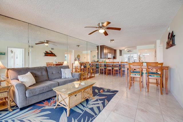 1901 Roosevelt Blvd Unit 404S, Key West, FL 33040 - living room featuring a textured ceiling, ceiling fan, and visible vents
