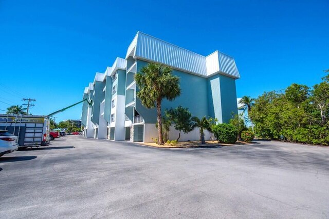 1901 Roosevelt Blvd Unit 404S, Key West, FL 33040 - view of building exterior featuring uncovered parking