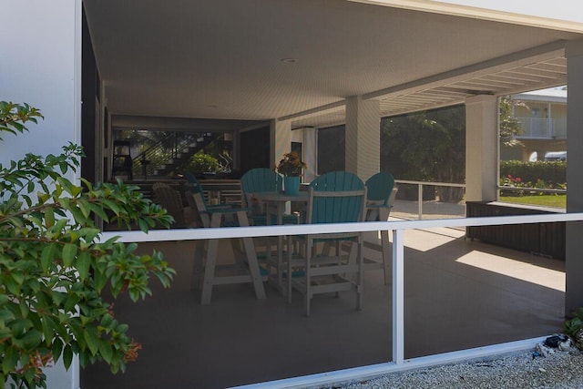 view of patio / terrace featuring stairs