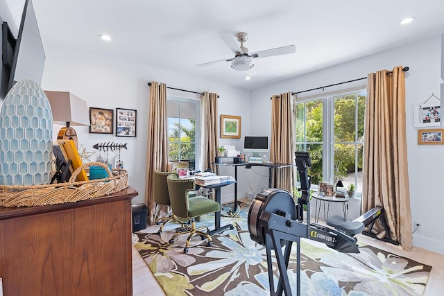 home office featuring baseboards, recessed lighting, ceiling fan, and wood finished floors