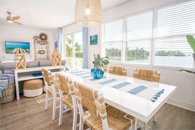 dining room featuring an inviting chandelier and wood finished floors