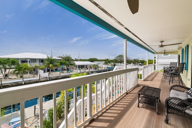 balcony featuring ceiling fan