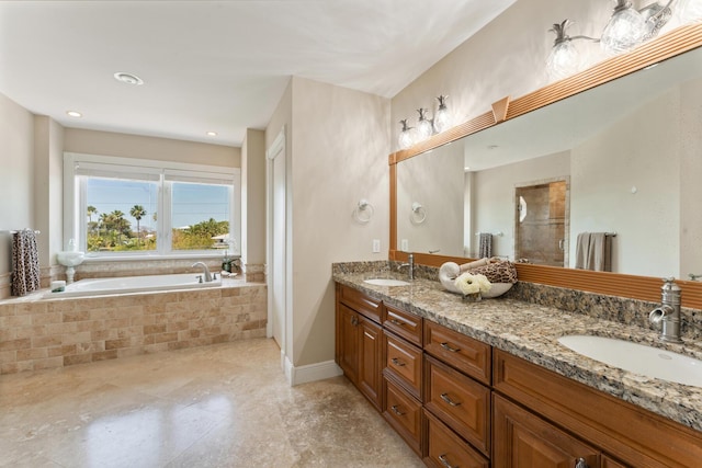bathroom featuring a sink, a bath, double vanity, and a tile shower