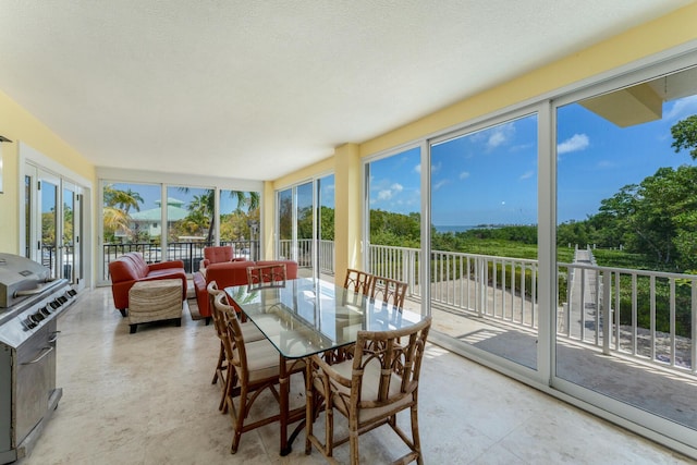 sunroom / solarium with french doors and a wealth of natural light