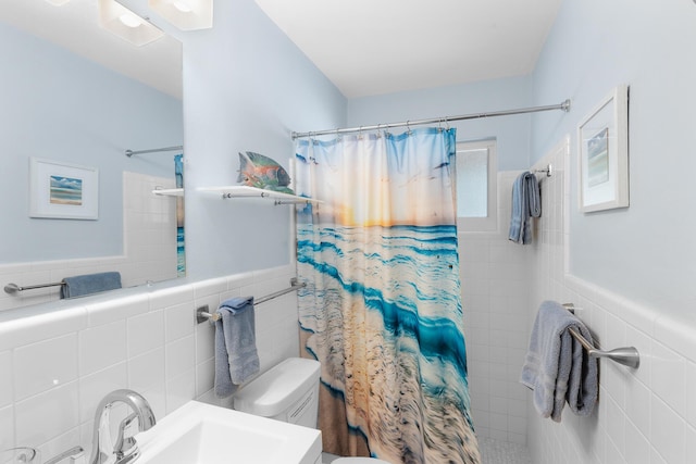 full bathroom featuring tile walls, toilet, and tiled shower