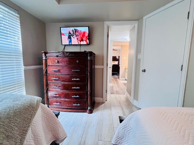 8202 Marina Villa Dr Unit 8202, Duck, FL 33050 - bedroom featuring baseboards and light wood-style floors