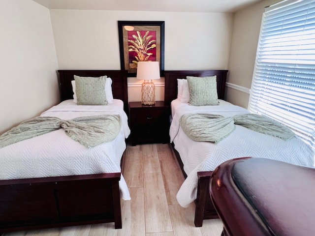 8202 Marina Villa Dr Unit 8202, Duck, FL 33050 - bedroom with light wood-style floors