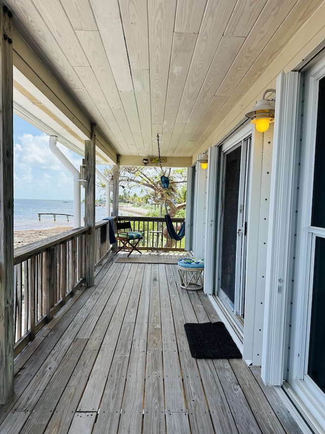 1W Cooks Is, Big Pine, FL 33043 - wooden porch featuring view of water and beach