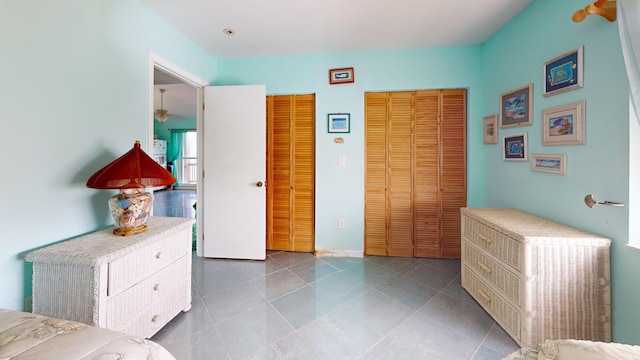1W Cooks Is, Big Pine, FL 33043 - bedroom with multiple closets and tile patterned flooring