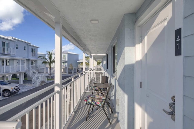 balcony featuring a residential view