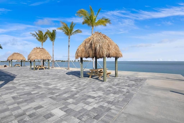 property view of water with a gazebo