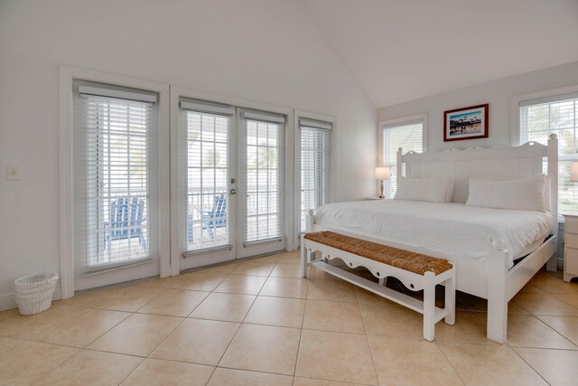 2600 Overseas Hwy Unit 5, Marathon, FL 33050 - bedroom with access to outside, lofted ceiling, light tile patterned floors, and french doors