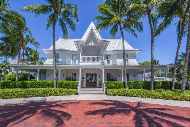 2600 Overseas Hwy Unit 5, Marathon, FL 33050 - view of front of house featuring covered porch, a balcony, a standing seam roof, and metal roof