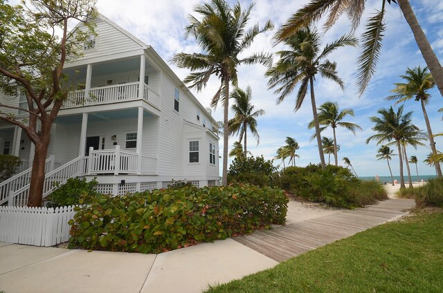 2600 Overseas Hwy Unit 5, Marathon, FL 33050 - view of side of property featuring a balcony, crawl space, and a water view