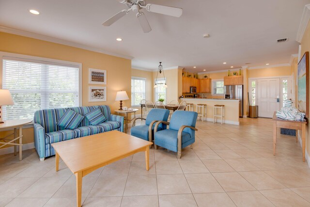 2600 Overseas Hwy Unit 5, Marathon, FL 33050 - living area with light tile patterned floors, recessed lighting, crown molding, and a ceiling fan