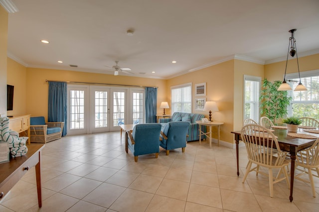 2600 Overseas Hwy Unit 5, Marathon, FL 33050 - living room with healthy amount of natural light, a ceiling fan, light tile patterned flooring, crown molding, and recessed lighting