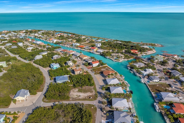 bird's eye view with a water view and a residential view