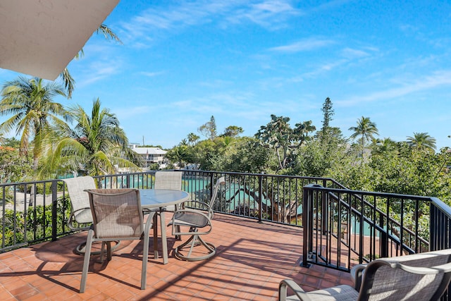 deck with outdoor dining area