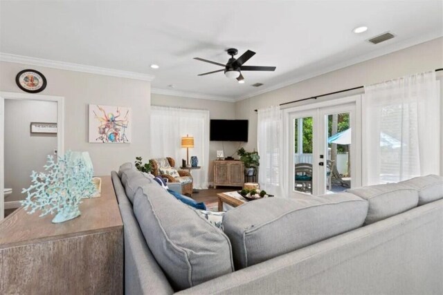 7202 Simran Ln, Duck, FL 33050 - living area featuring ceiling fan, french doors, crown molding, recessed lighting, and wood finished floors
