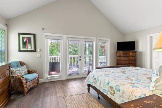 7202 Simran Ln, Duck, FL 33050 - bedroom featuring access to outside, hardwood / wood-style flooring, and high vaulted ceiling
