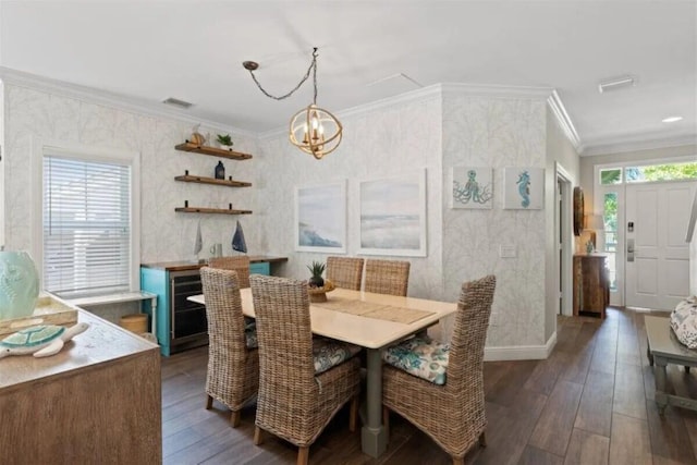 7202 Simran Ln, Duck, FL 33050 - dining room with crown molding, a chandelier, and dark wood-style floors